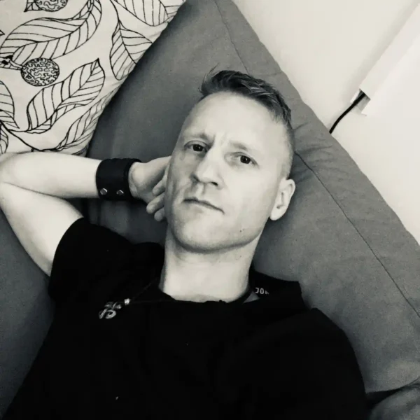 John laying in the sofa at home